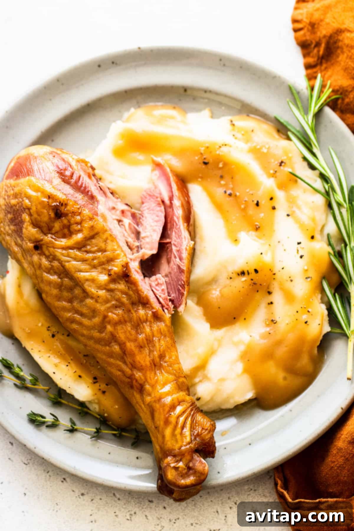 Tender Smoked Turkey Legs 6 Smoked turkey legs served with creamy mashed potatoes, a classic comforting combination.