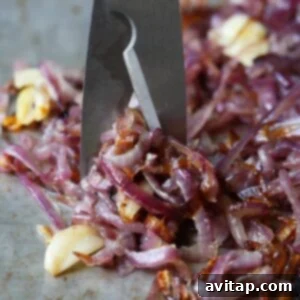 Effortless Golden Caramelized Onions 4 Caramelized onions baking slowly in the oven, offering a convenient hands-off alternative.