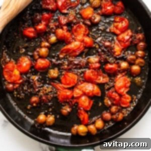 cooked tomatoes in skillet.