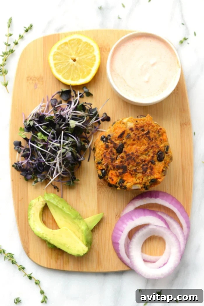 Perfectly pan-fried quinoa sweet potato burgers with a golden-brown crust.
