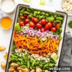Ultimate garden salad, a close-up shot showcasing the fresh ingredients and vibrant colors.