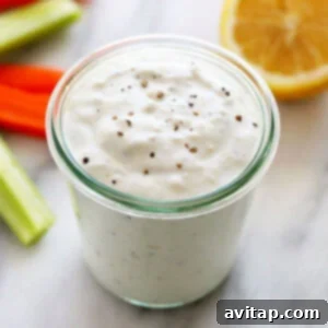 Vibrant Garden Medley 2 A bowl of creamy, homemade blue cheese dressing, perfect for complementing a fresh garden salad.