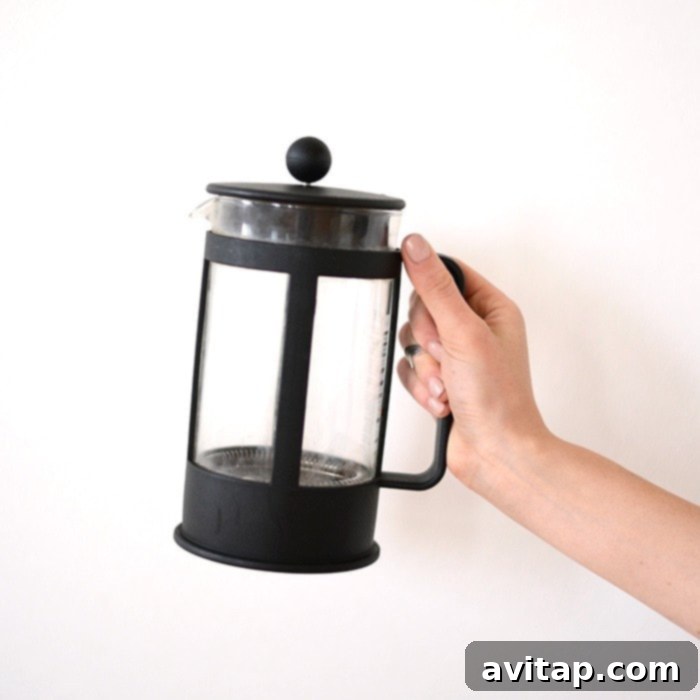 Bodum French Press coffee maker with freshly brewed coffee