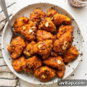 A bowl of crispy hot honey chicken poppers, ready to serve as the main recipe image.