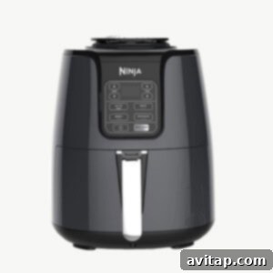 A clean, modern Ninja Air Fryer on a white background, highlighting its sleek design and capacity.