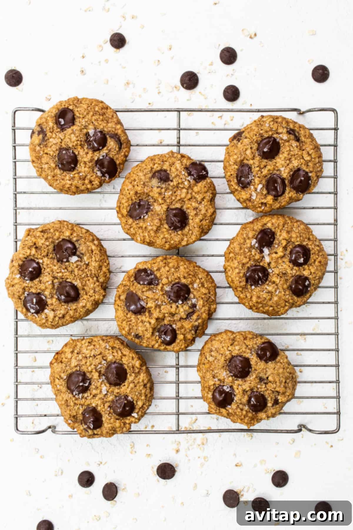 Warm lactation cookies cooling on a wire rack after being baked.
