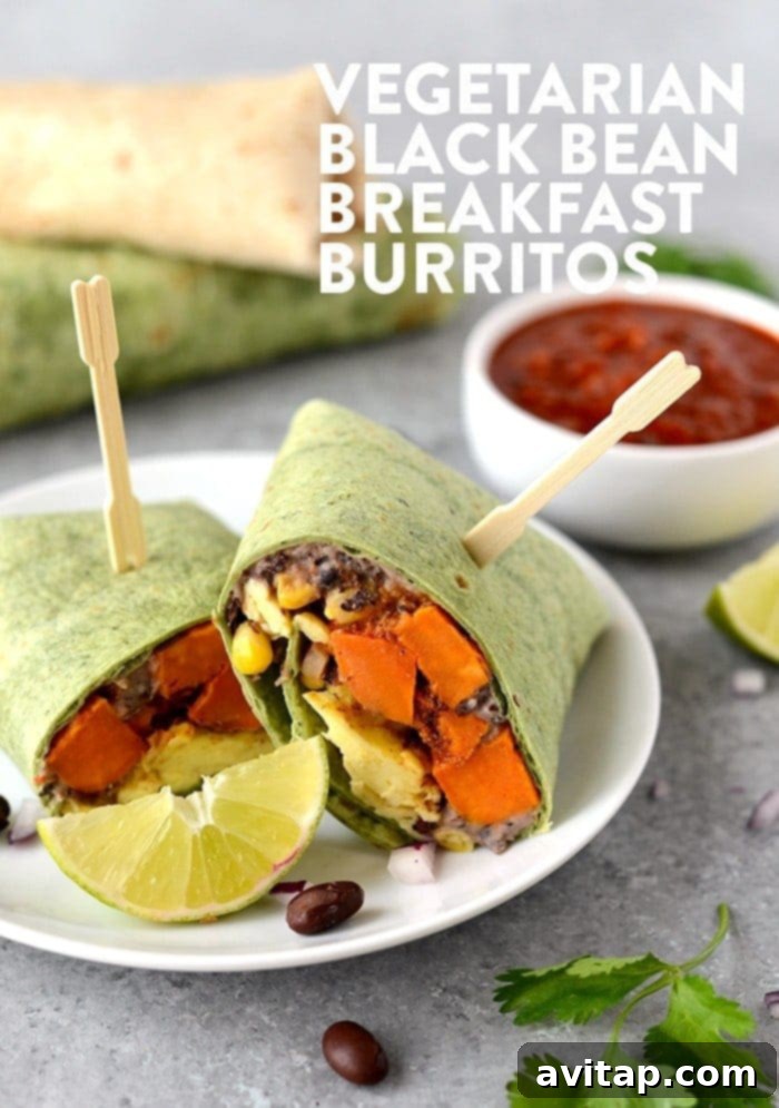 Hearty vegetarian black bean breakfast burritos, wrapped neatly and displayed on a plate, ready for a delicious meal.