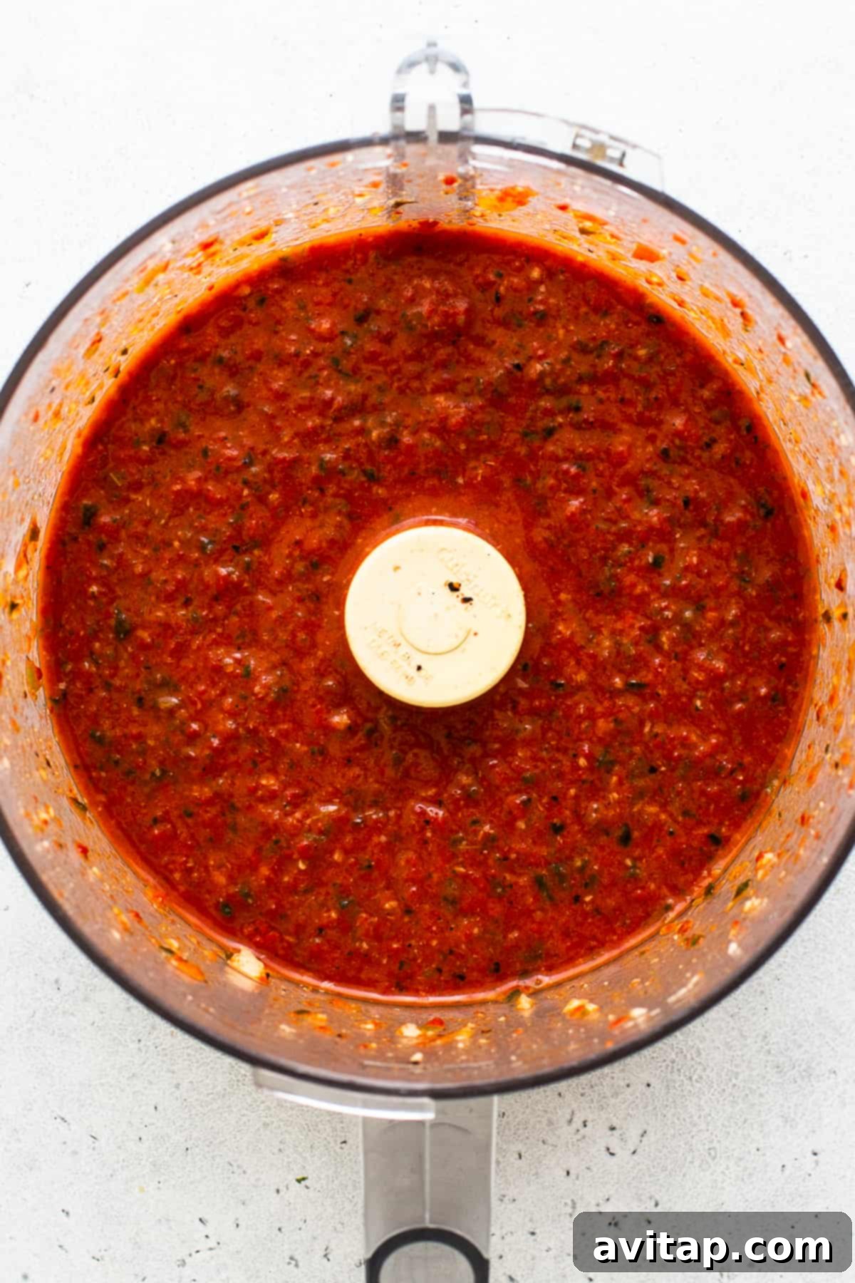 Roasted red pepper sauce blended smooth in a food processor.