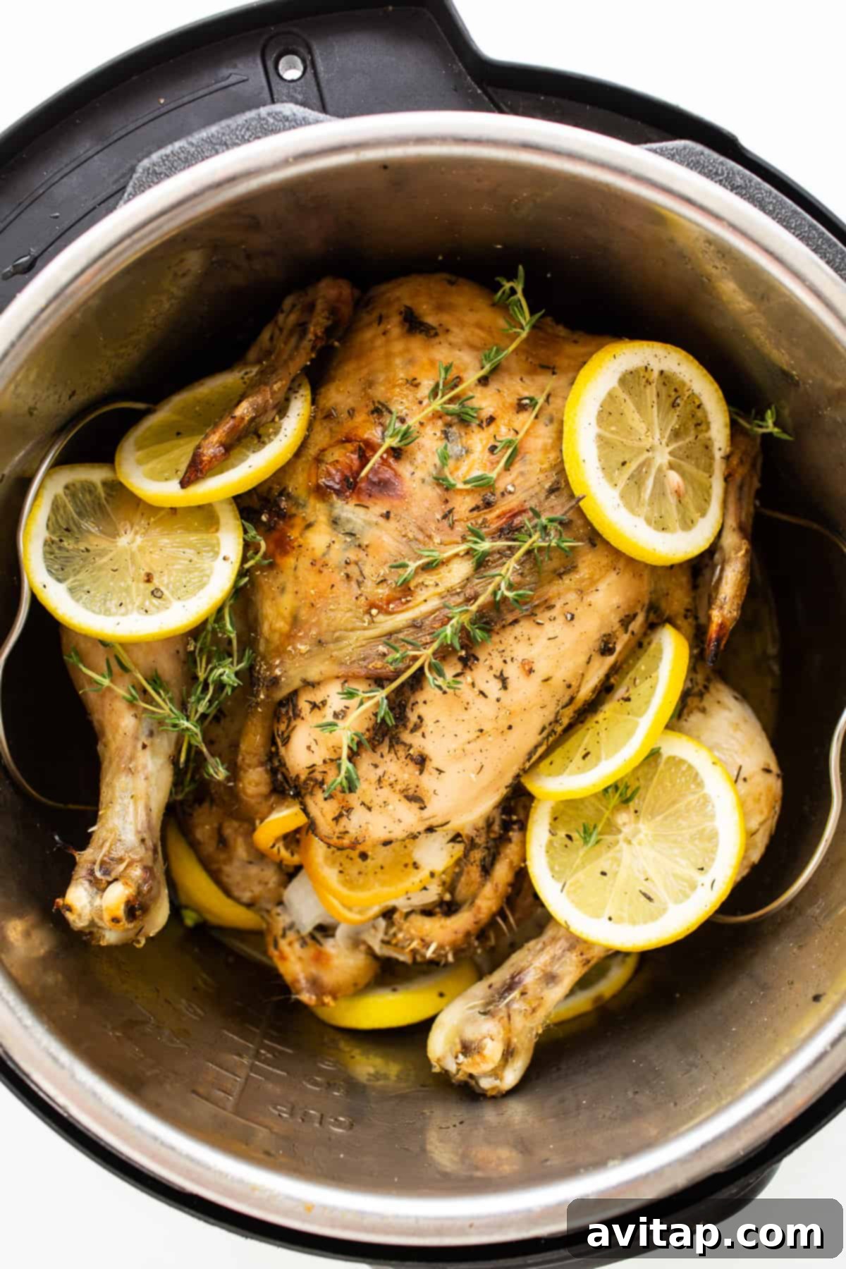 Juicy Instant Pot Whole Chicken Recipe A perfectly cooked, golden-brown whole chicken in an Instant Pot, ready to be served.