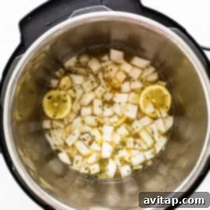 Tender Instant Pot Whole Chicken 5 Liquid and onions deglazing the instant pot.