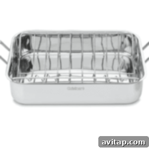 A high-quality stainless steel roasting pan with a wire rack on a clean background.