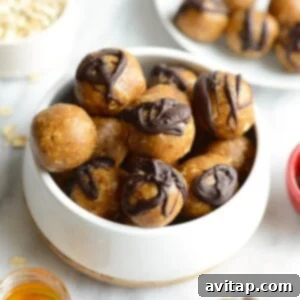 A bowl of freshly prepared peanut butter energy balls, ready to be enjoyed as a healthy snack.