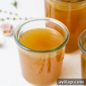 Finished turkey stock elegantly stored in a glass jar.