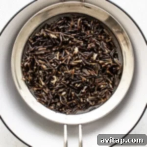 Black tea on a white surface.