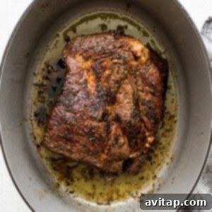 A pan with a piece of meat in it.
