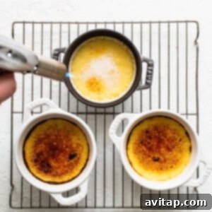 Torching the top of the Eggnog Creme Brûlée.