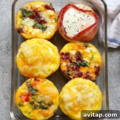 An assortment of colorful breakfast egg cups baked in a glass dish, perfect for meal prepping.