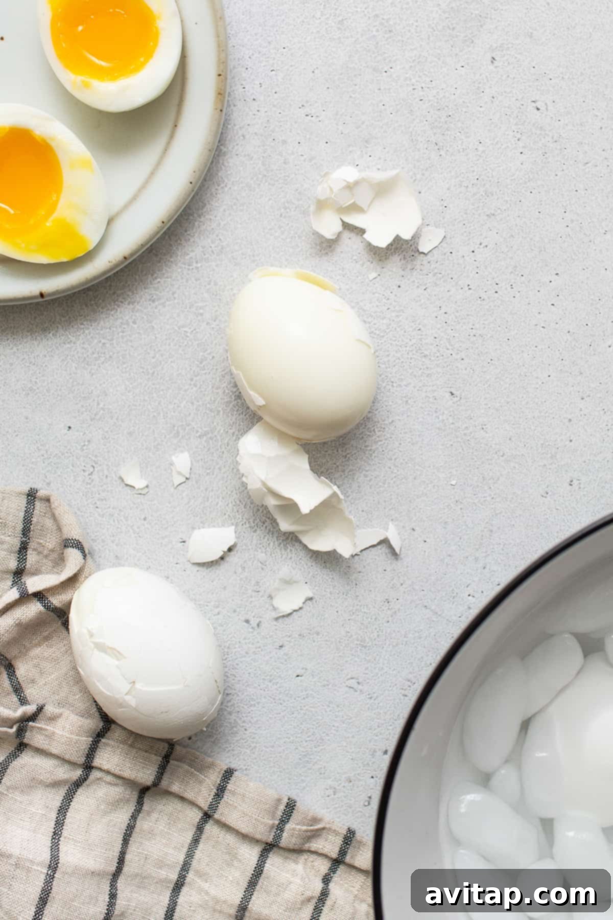 Peeled soft boiled eggs, showing perfectly cooked whites and the promise of a runny yolk.