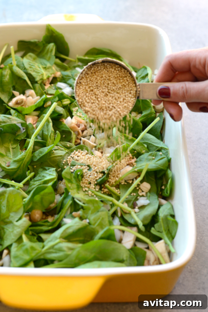 The vibrant ingredients of a lightened spinach quinoa lasagna casserole before assembly, promising a no-hassle, protein-packed, gluten-free, and flavorful dinner.