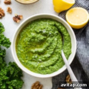 Israeli Couscous Medley 4 A bowl filled with vibrant green kale pesto, ready to be used.