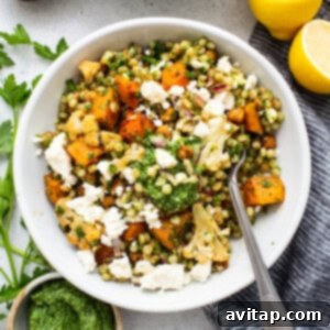 Couscous salad in a bowl, showcasing its vibrant ingredients and inviting presentation.