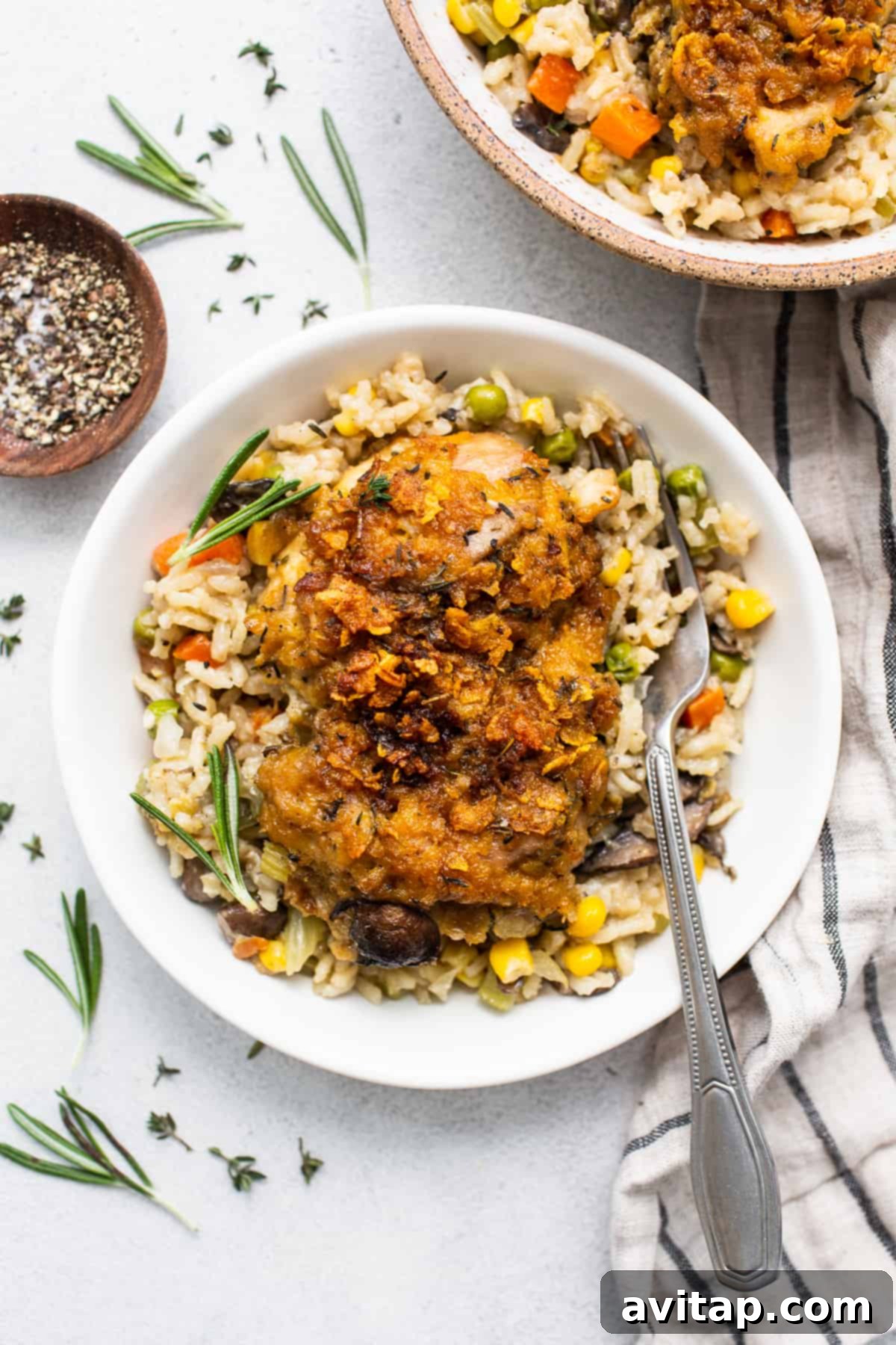 Single serving bowl of chicken pot pie skillet with crispy topping.