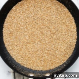 Quinoa puffing in a hot skillet.