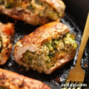 Delicious broccoli and cheese stuffed chicken breast cooked in a cast iron skillet.