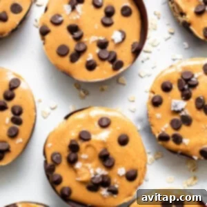 Ready-to-eat peanut butter oat cups on a counter.