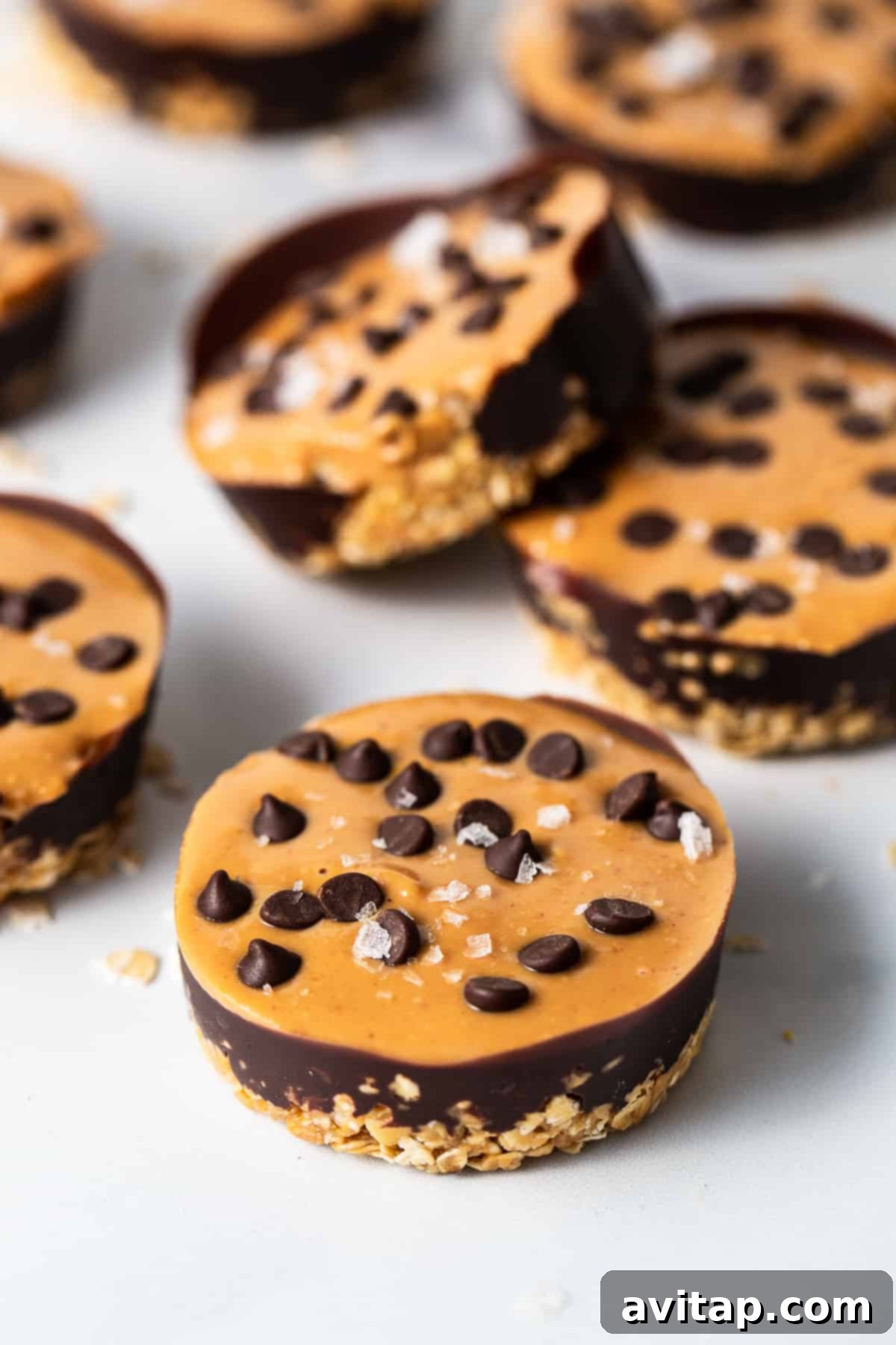A final shot of chocolate peanut butter oat cups on a counter, ready to be stored or enjoyed.