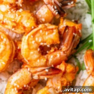 Spicy garlic prawns served in a bowl, ready to eat.