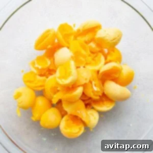 Broken eggs in a glass bowl.