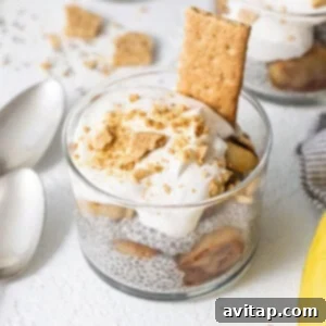 A delectable banana cream pie chia seed pudding, layered with creamy textures and garnished with fresh banana slices.