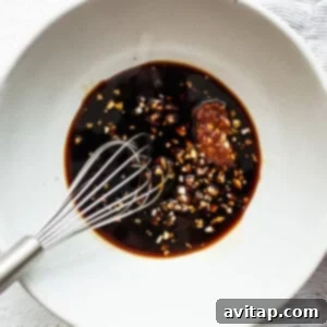 All sauce ingredients whisked together in a bowl.