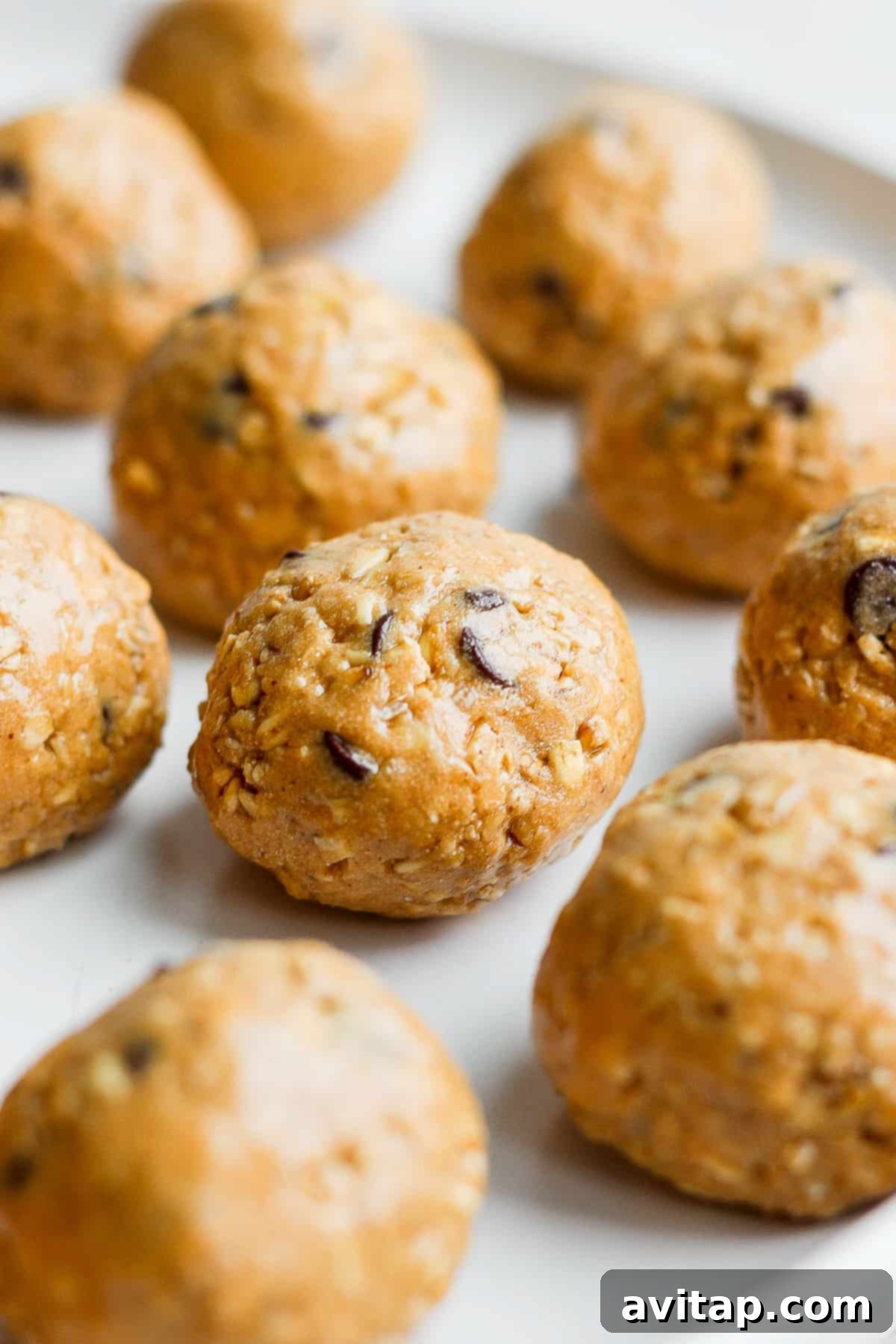 Collagen cookie dough balls neatly arranged on a plate, ready to serve.