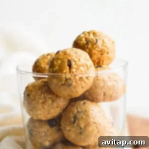 Close-up of collagen cookie dough bites in a glass jar, ready to be enjoyed.