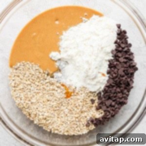 All dry and wet ingredients in a bowl for mixing.