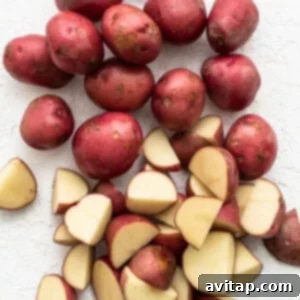 Sliced red potatoes on a white background.