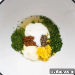 A white bowl with ingredients in it.