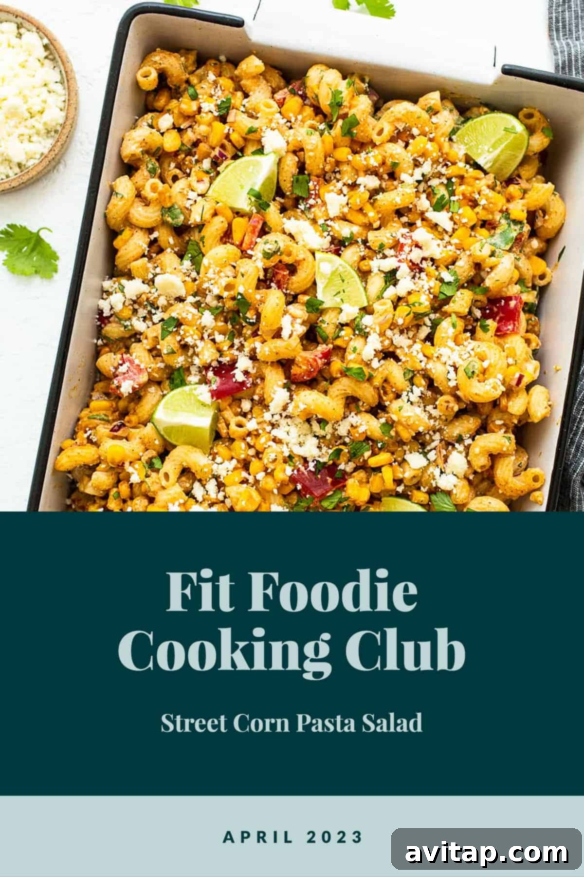 A vibrant bowl of Mexican street corn pasta salad, ready to be served at a gathering.