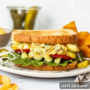 Classic Homemade Egg Salad Sandwich 8 Egg salad sandwich on a plate.