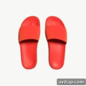 A pair of vibrant red Lululemon Restfeel slide sandals on a clean white background.