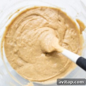 Creamy coffee cake batter in a bowl, smoothly mixed.