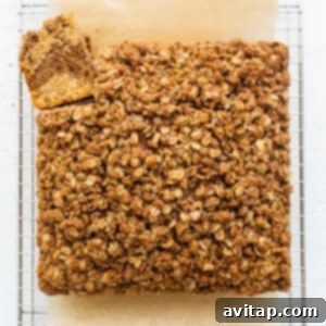 Coffee cake slices cooling on a wire rack.