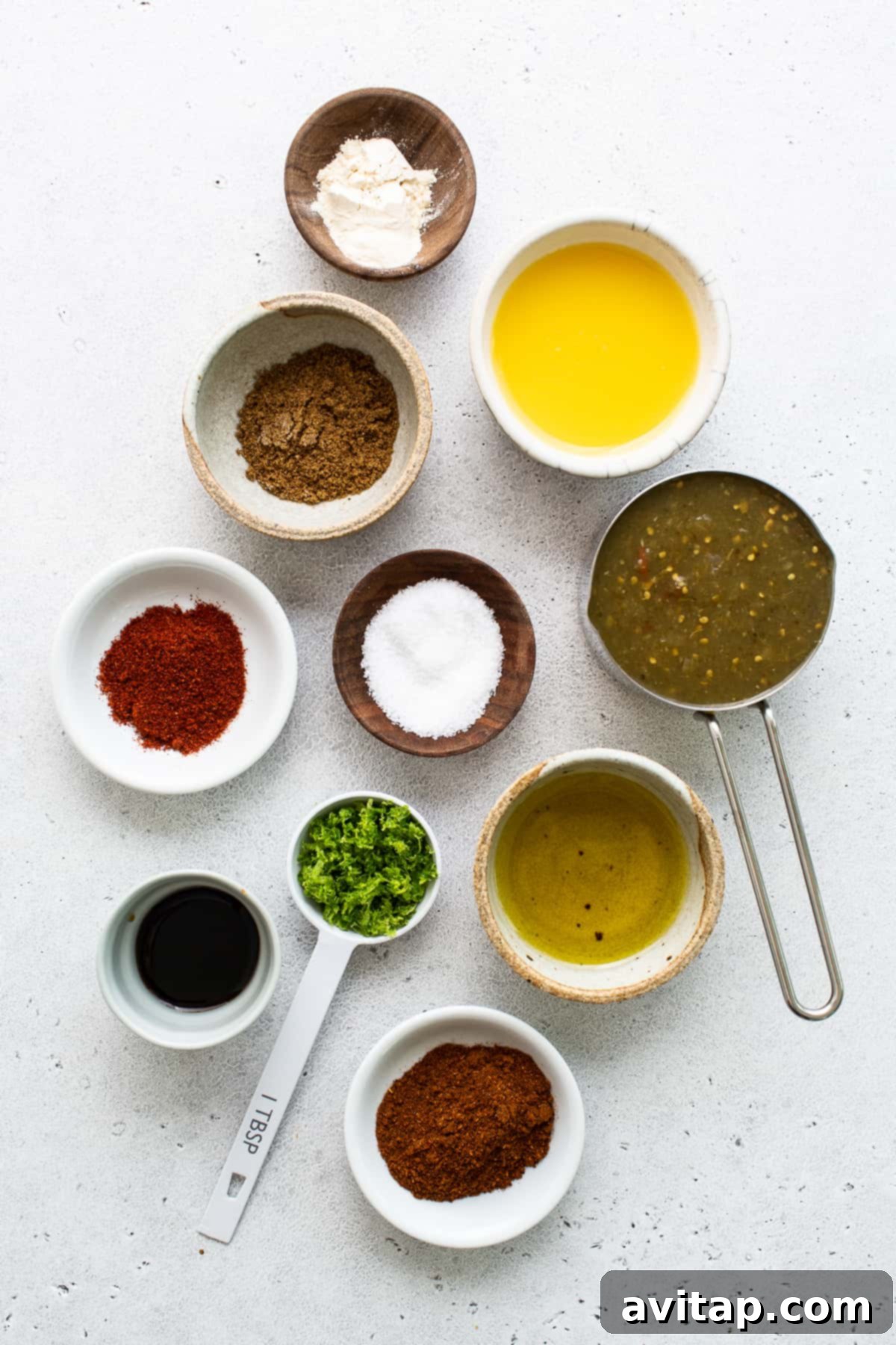 Key Ingredients for a Zesty Steak Fajita Marinade All the essential ingredients for a delicious steak fajita marinade displayed in small bowls.