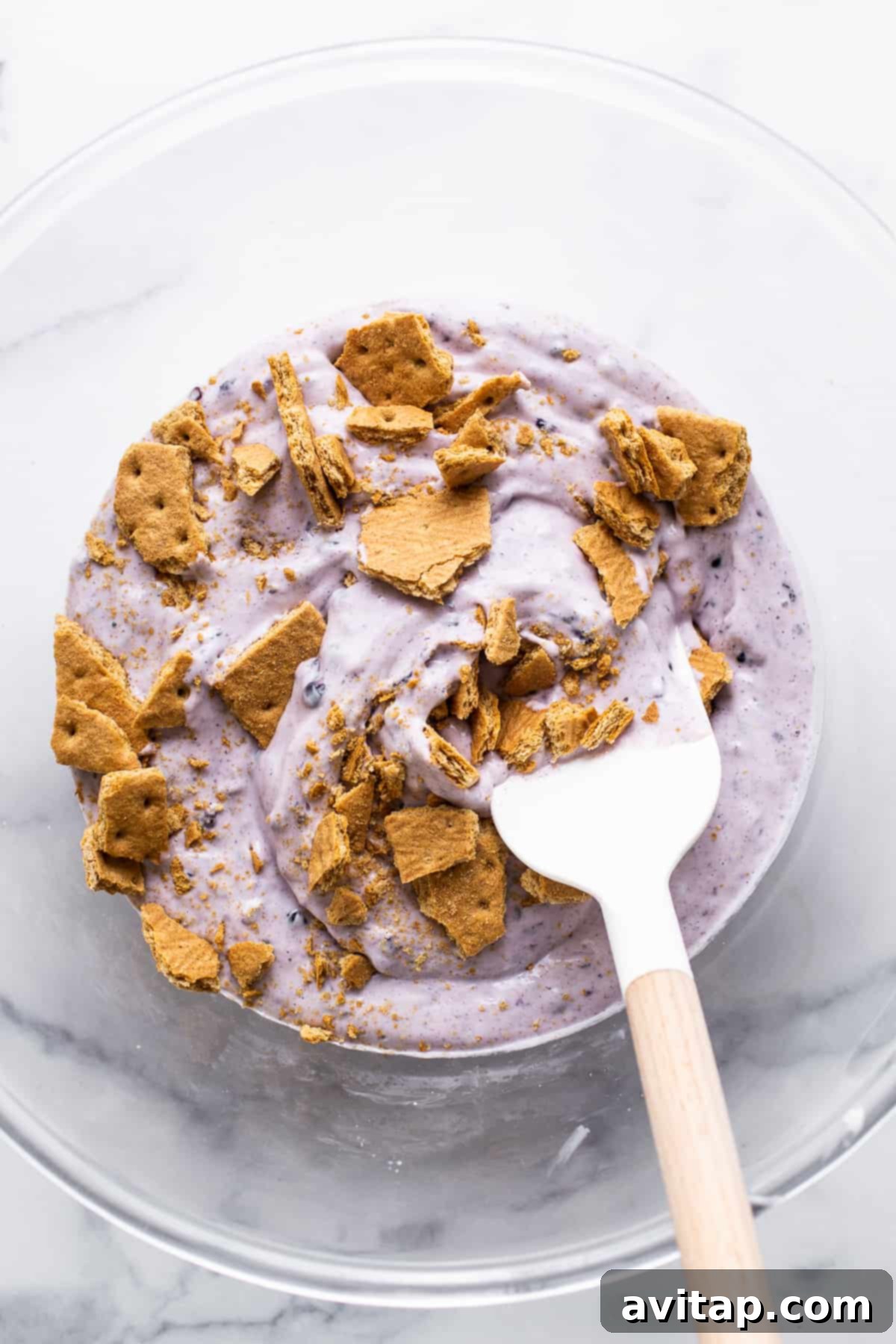 Creamy cottage cheese ice cream mixture in a mixing bowl, ready for freezing.