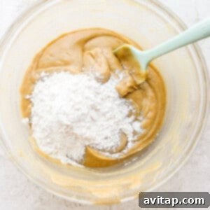 a bowl of peanut butter and powdered sugar.