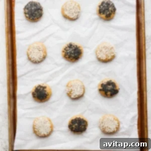 sesame sesame cookies on a baking sheet.