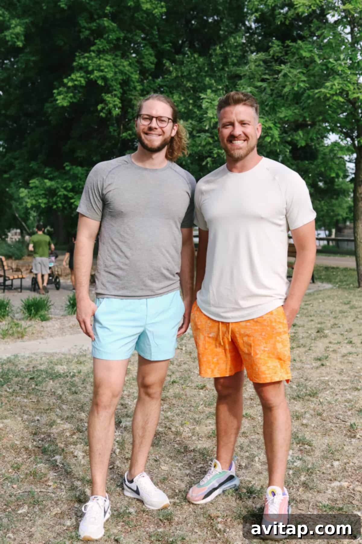 Two men confidently standing side-by-side, showcasing their Lululemon men's shorts.