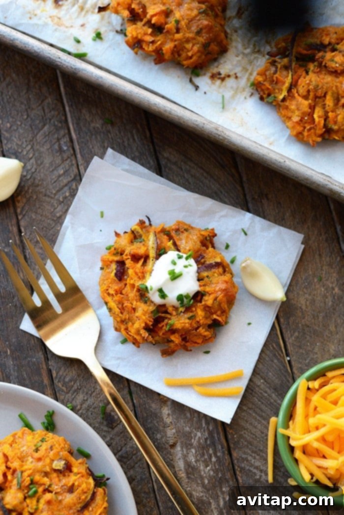 Baked Cheddar Sweet Potato Fritters: A Healthier Take on Hash Browns Crispy cheddar sweet potato hash brown fritters, ready to be enjoyed.